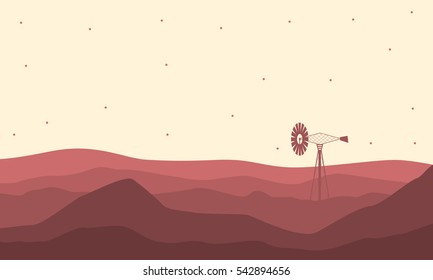 Silhouette of desert and windmill landscape