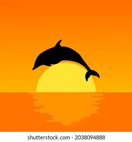 the silhouette of a dolphin jumping over the ocean at sunset