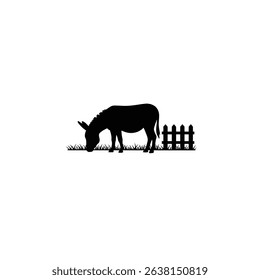 Silhouette: Donkey Grazing Peacefully Beside Fence  Rural Scene