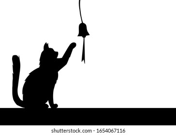 Silhouette drawing style of a cat that playing with a hanging toy. There’s a copy space for your text.