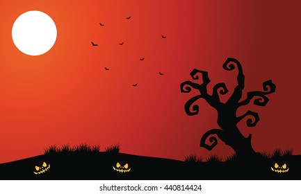 Silhouette of dry tree and bat Halloween a scary