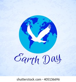 Silhouette of eagle over planet Earth. Earth Day