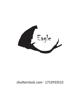 the silhouette of the eagle stands on a branch