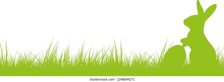 silhouette of easter bunny with easter egg in fresh green grass, vector illustration