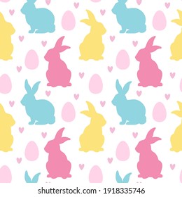 Silhouette Easter bunny,  egg, heart seamless pattern isolated on white background. Traditional symbol of Easter. Vector flat illustration. Design for textile, wrapping, wallpaper, backdrop