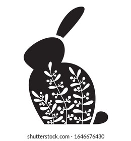 Silhouette of an Easter Bunny with white flowers on it. Black rabbit. Tshirt design print.