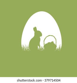 Silhouette of easter rabbit with a basket 