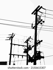 Silhouette of electric post and cable on white background.