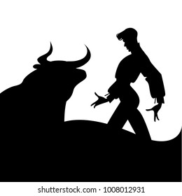 Silhouette of elegant Spanish flamenco dancer, dancing in front of a bull