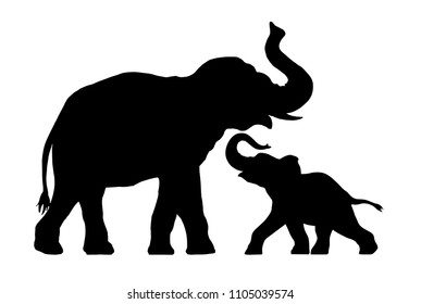 silhouette of elephant with baby elephant