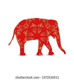 Silhouette of elephant with vintage curls. Golden and red shades.