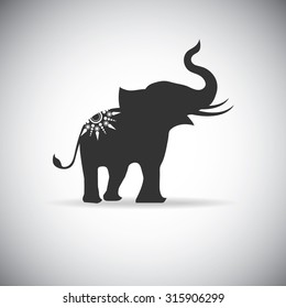 silhouette elephants with tattoo