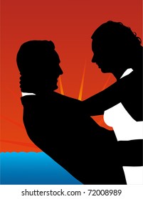 The silhouette of embracing couple. Sunset