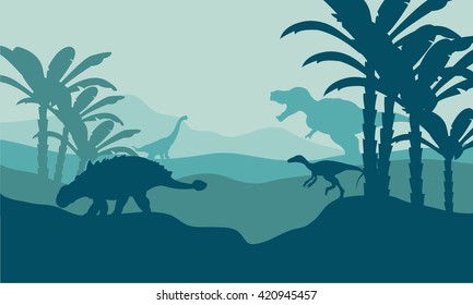Silhouette of eoraptor and ankylosaurus with blue bakcgrounds