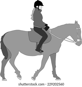 Silhouette of the equestrian of the jockey riding on a horse