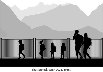 Silhouette family of mountains in the background.
