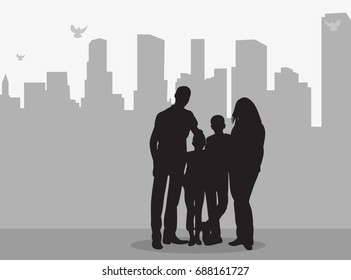 silhouette of family on city background