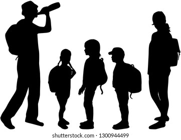 Silhouette family on a walk.