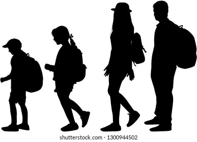 Silhouette family on a walk.