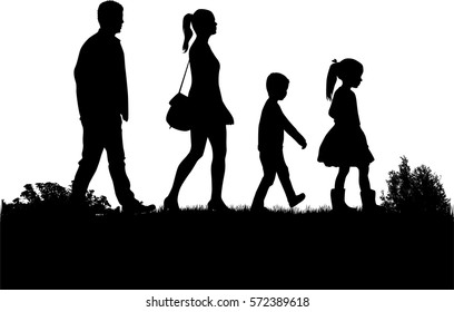 Silhouette family on a walk.