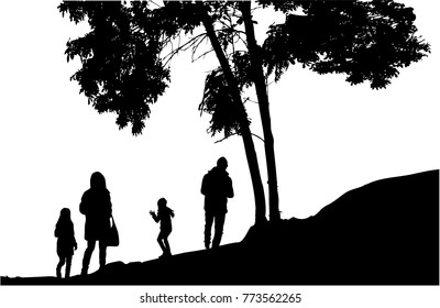 Silhouette family on a walk.