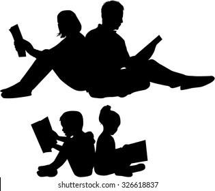 Silhouette of a family reading a book