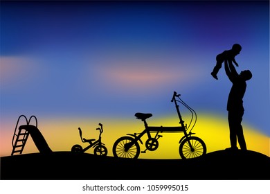 silhouette of father have fun with his children, slide, tricycle and folding bike at park when sunset or sunrise
