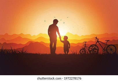 Silhouette of  father and son in the park at the sunset time .Concept of friendly family and father day.