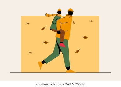 Silhouette of a father walking and carrying his child on a breezy autumn day