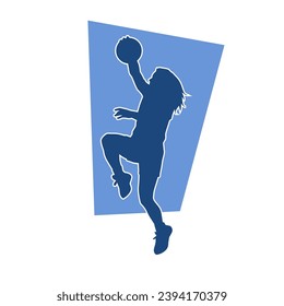 Silhouette of a female athlete doing basket ball pose. Silhouette of a woman basket ball player in action pose.