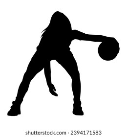 Silhouette of a female athlete doing basket ball pose. Silhouette of a woman basket ball player in action pose.