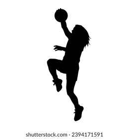 Silhouette of a female athlete doing basket ball pose. Silhouette of a woman basket ball player in action pose.