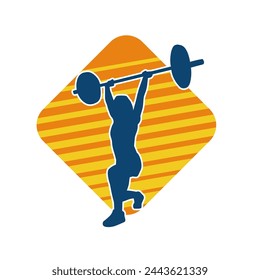 Silhouette of female athlete doing weight lifting sport