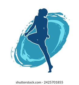 Silhouette of a female ballet dancer in action pose. Silhouette of a ballerina girl dancing pose.