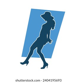 Silhouette of a female dancer in action pose. Silhouette of a slim woman in dancing pose.