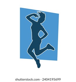 Silhouette of a female dancer in action pose. Silhouette of a slim woman in dancing pose.