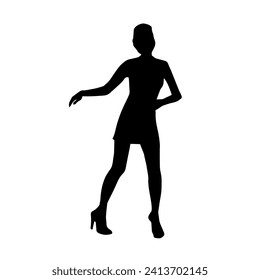 Silhouette of a female dancer in action pose. Silhouette of a slim woman in dancing pose.