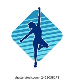 Silhouette of a female dancer in action pose. Silhouette of a slim woman in dancing pose.