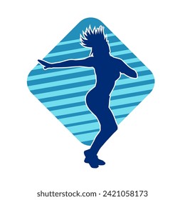 Silhouette of a female dancer in action pose. Silhouette of a slim woman in dancing pose.