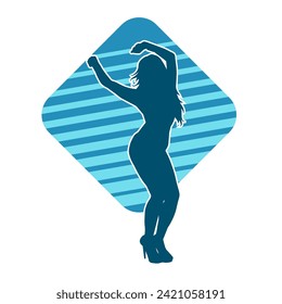 Silhouette of a female dancer in action pose. Silhouette of a slim woman in dancing pose.