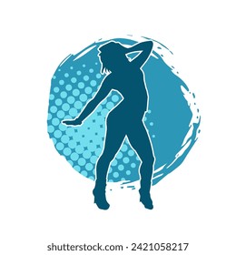 Silhouette of a female dancer in action pose. Silhouette of a slim woman in dancing pose.