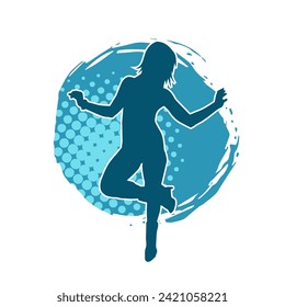 Silhouette of a female dancer in action pose. Silhouette of a slim woman in dancing pose.