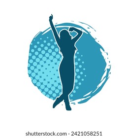 Silhouette of a female dancer in action pose. Silhouette of a slim woman in dancing pose.