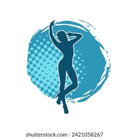 Silhouette of a female dancer in action pose. Silhouette of a slim woman in dancing pose.