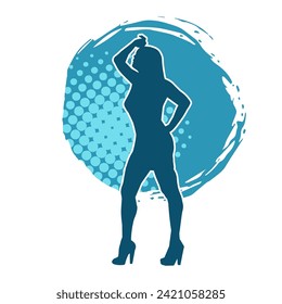 Silhouette of a female dancer in action pose. Silhouette of a slim woman in dancing pose.