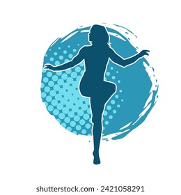 Silhouette of a female dancer in action pose. Silhouette of a slim woman in dancing pose.