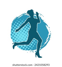 Silhouette of a female dancer in action pose. Silhouette of a slim woman in dancing pose.