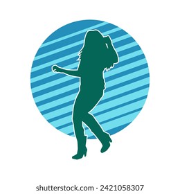 Silhouette of a female dancer in action pose. Silhouette of a slim woman in dancing pose.