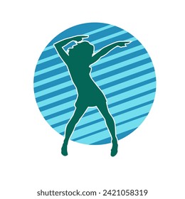 Silhouette of a female dancer in action pose. Silhouette of a slim woman in dancing pose.