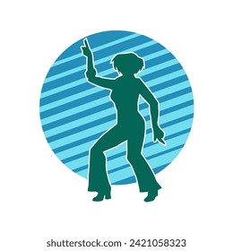 Silhouette of a female dancer in action pose. Silhouette of a slim woman in dancing pose.